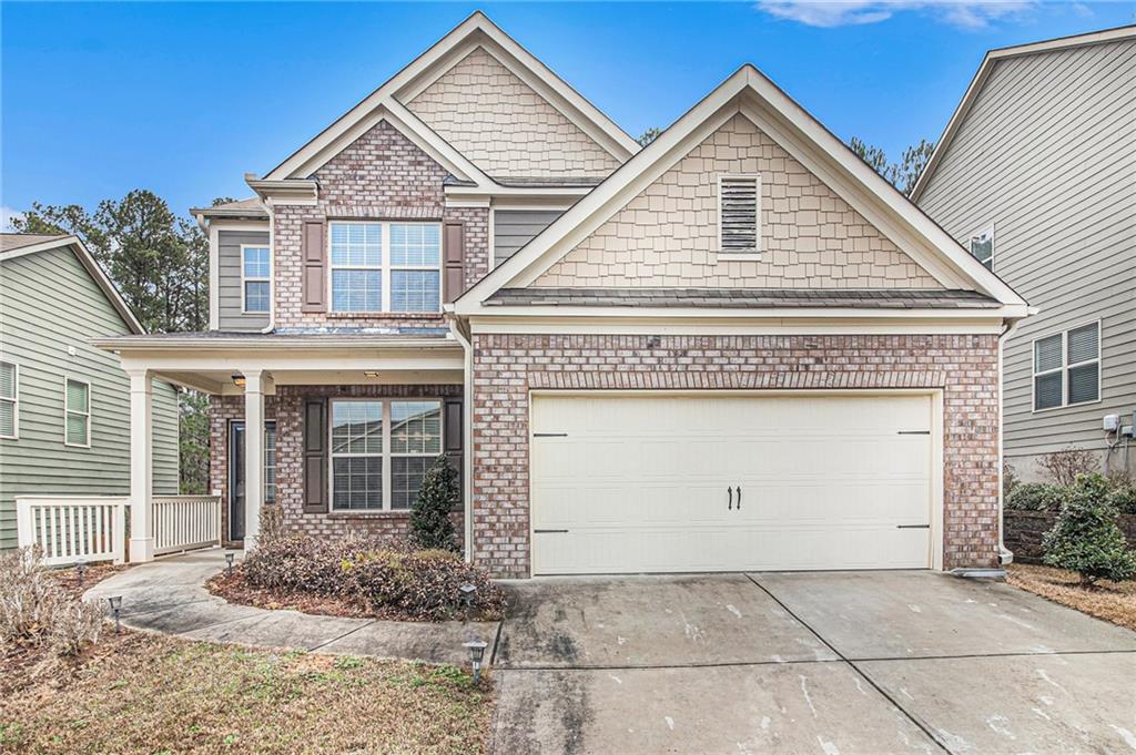 7780 Mastiff Road Fairburn, GA 30213 - Photo 1 of 1 a front view of a house with garden