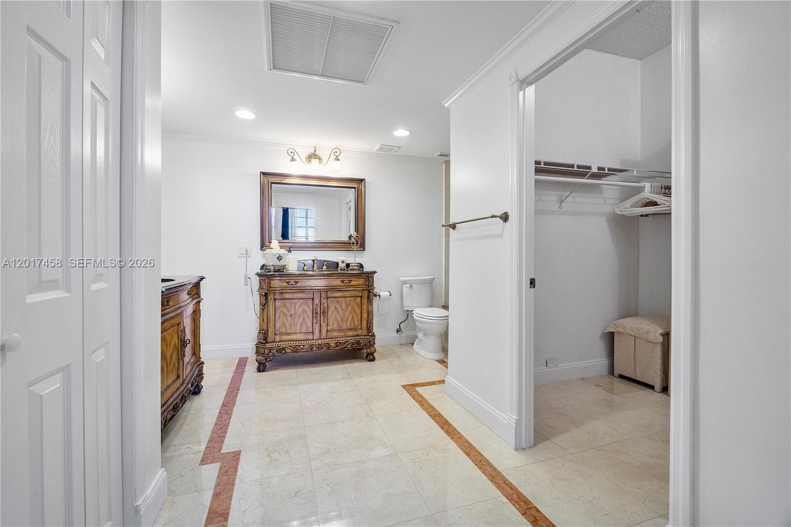 2851 South Ocean Boulevard, Unit 7U Boca Raton, FL 33432 - Photo 14 of 15 a view of a kitchen with a sink and refrigerator