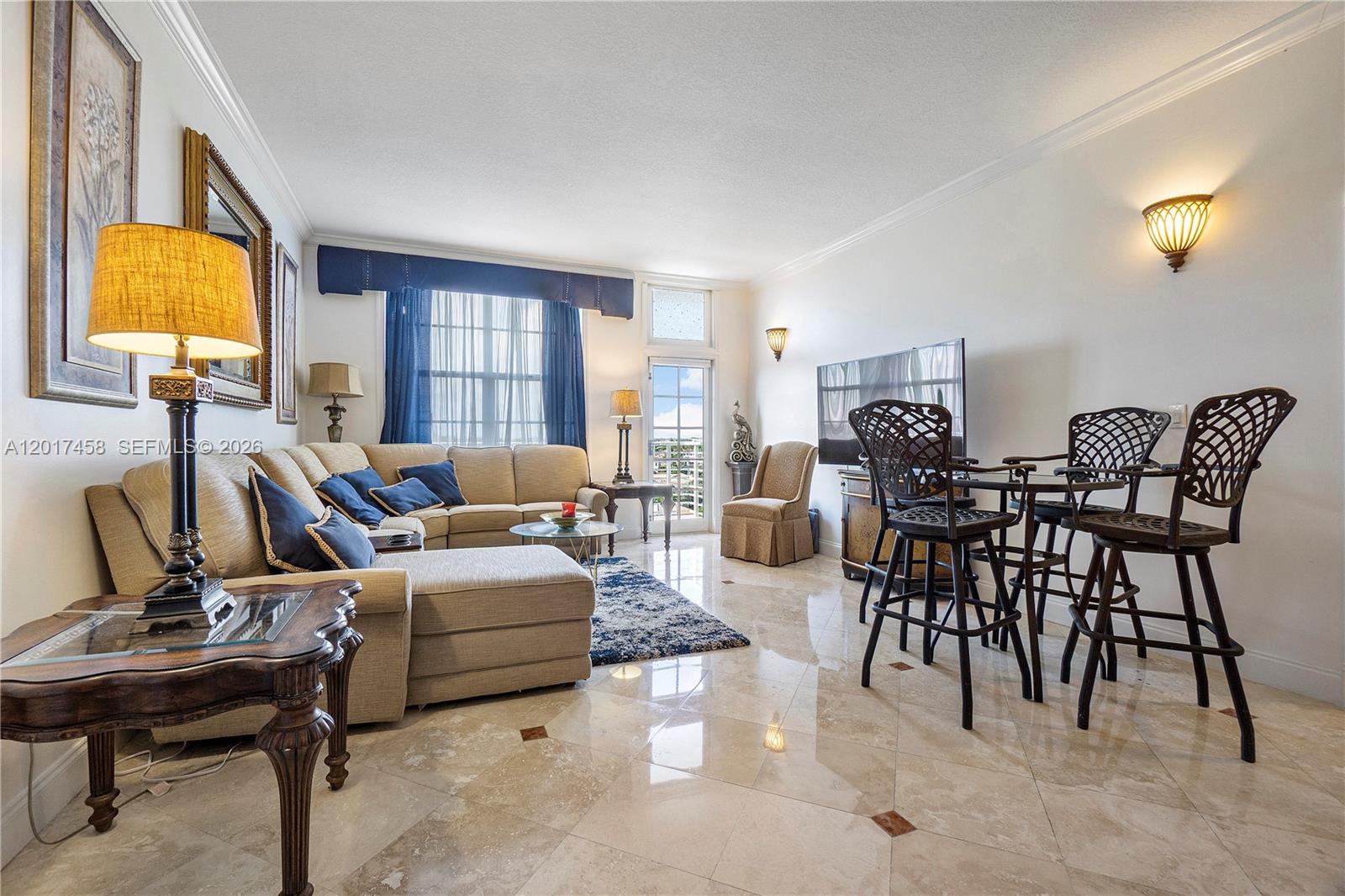2851 South Ocean Boulevard, Unit 7U Boca Raton, FL 33432 - Photo 8 of 15 a living room with furniture and a window