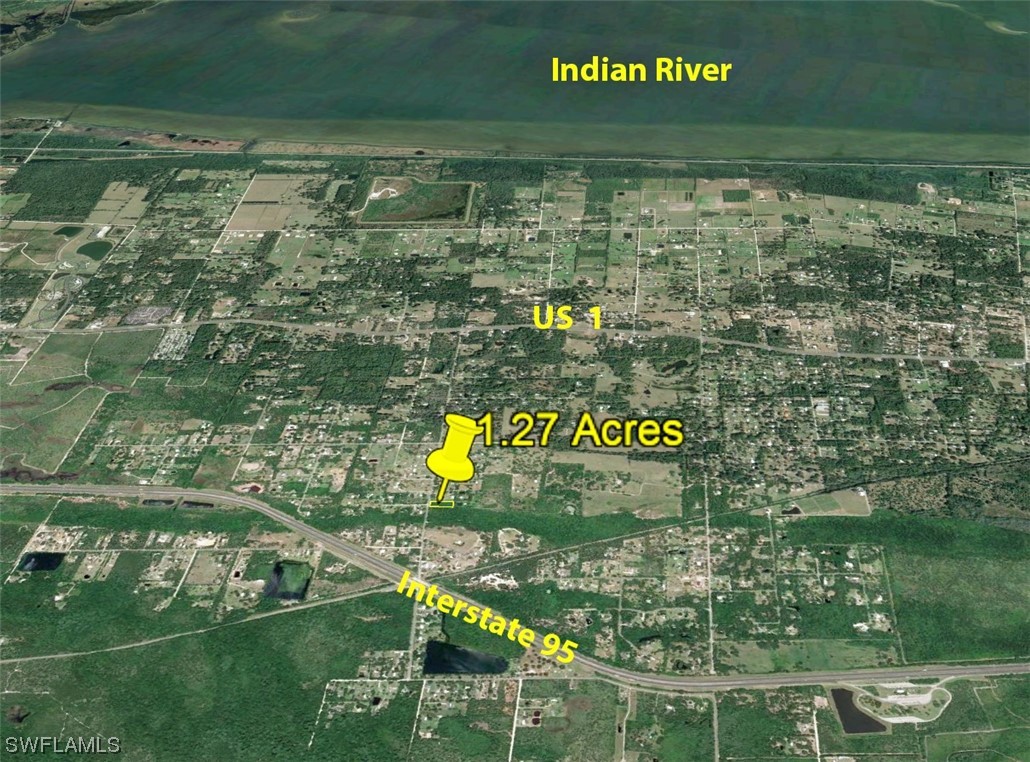 Aurantia Road Titusville, FL 32796 - Photo 3 of 3 a sign that is on a brick wall