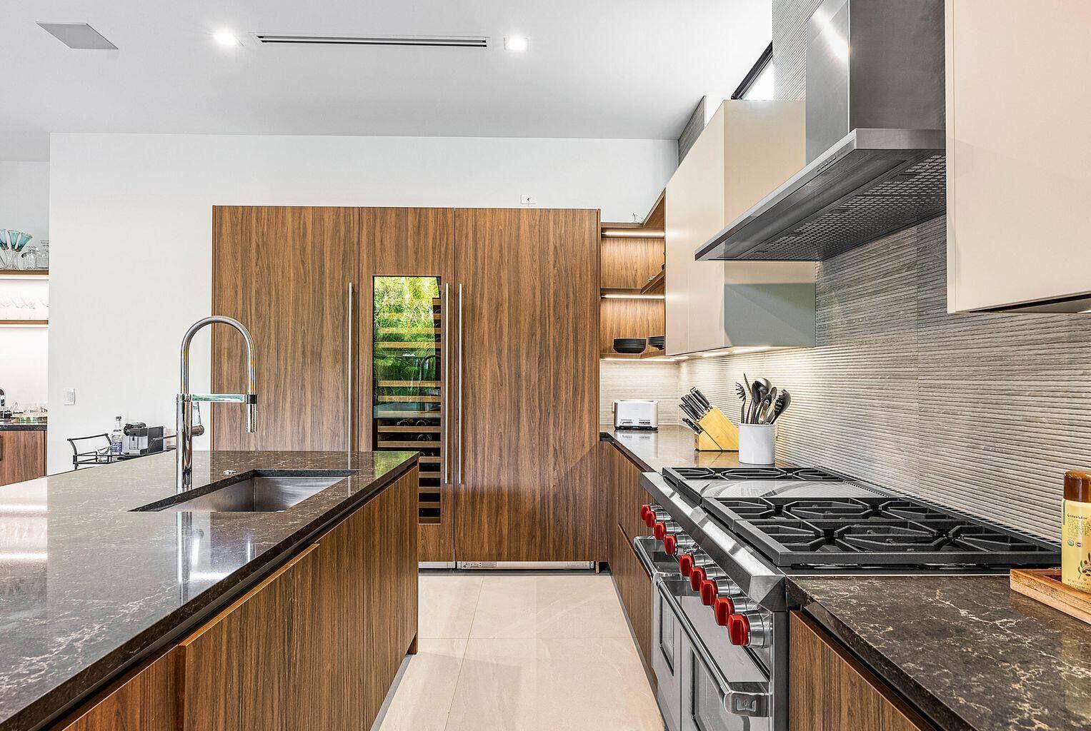 775 Park Drive West Boca Raton, FL 33432 - Photo 13 of 31 a kitchen with a stove and a sink