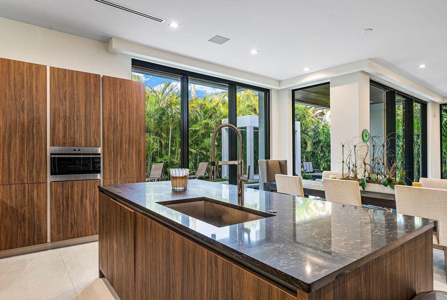 775 Park Drive West Boca Raton, FL 33432 - Photo 14 of 31 a kitchen with kitchen island a large window in it