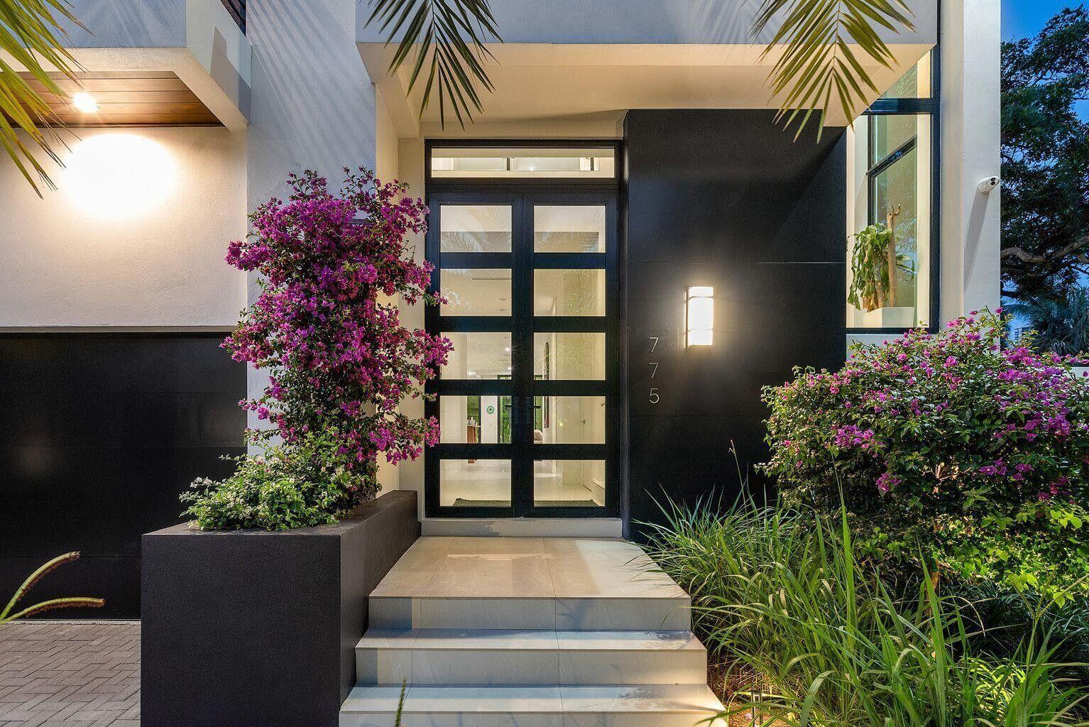 775 Park Drive West Boca Raton, FL 33432 - Photo 2 of 31 a front view of a house