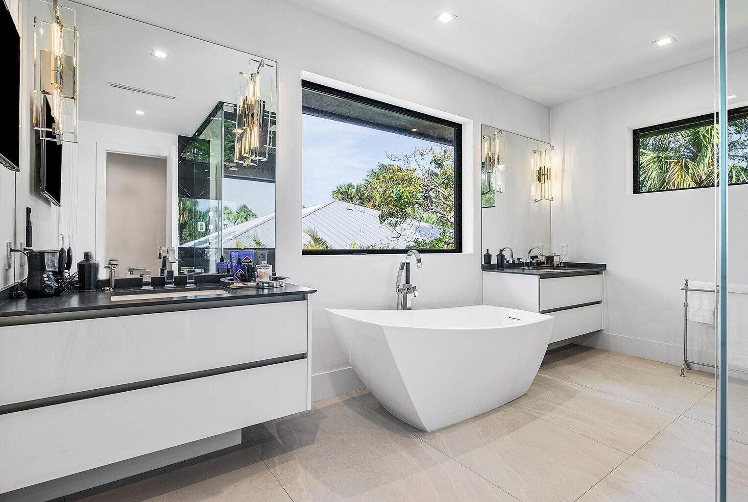 775 Park Drive West Boca Raton, FL 33432 - Photo 30 of 31 a bathroom with a bathtub and a sink