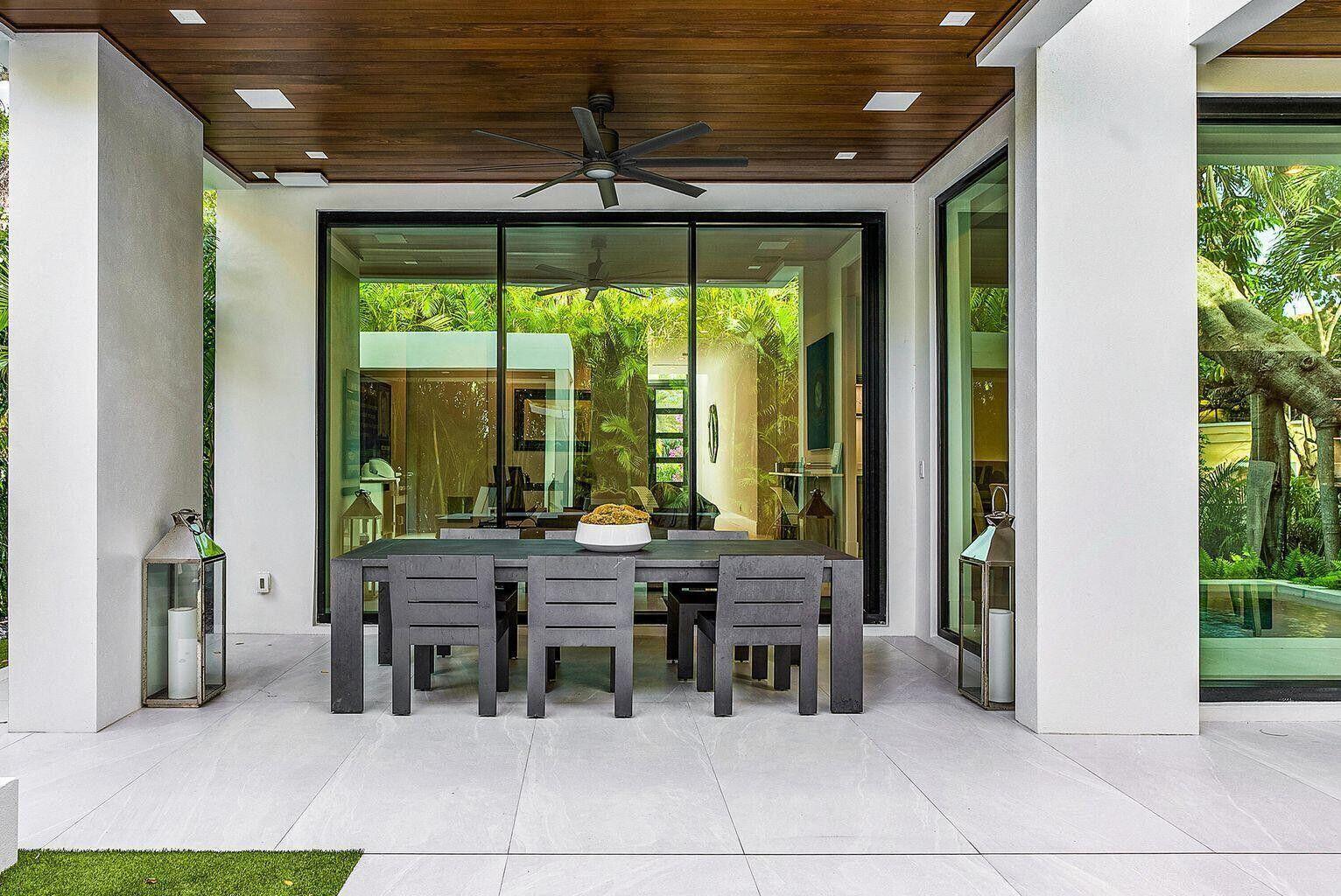 775 Park Drive West Boca Raton, FL 33432 - Photo 9 of 31 a table and chairs in front of a room