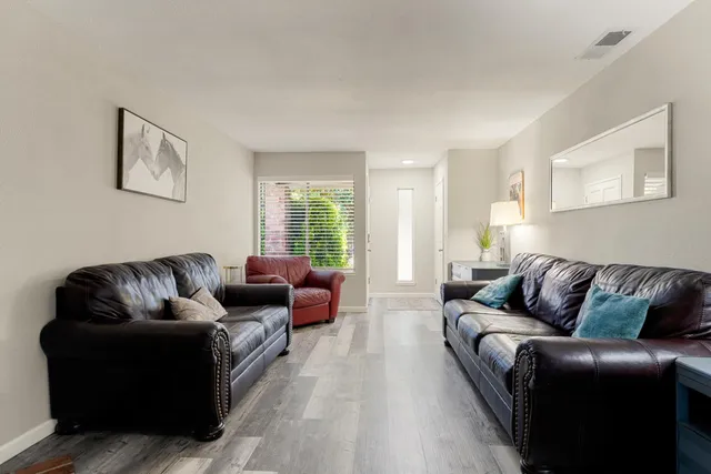 a living room with furniture and a couch