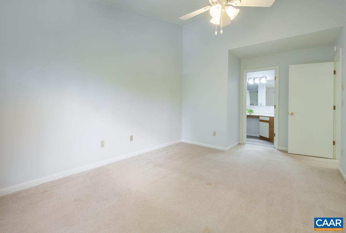 117 Turtle Creek Road, Unit 9 Charlottesville, VA 22901 - Photo 14 of 33 a view of an empty room with a window