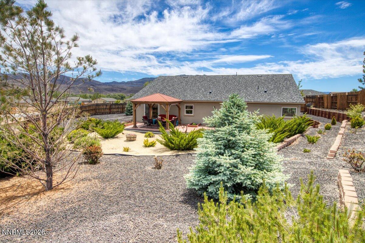 104 Bethpage Road Dayton, NV 89403 - Photo 43 of 65 an aerial view of a house with a yard basket ball court and outdoor seating