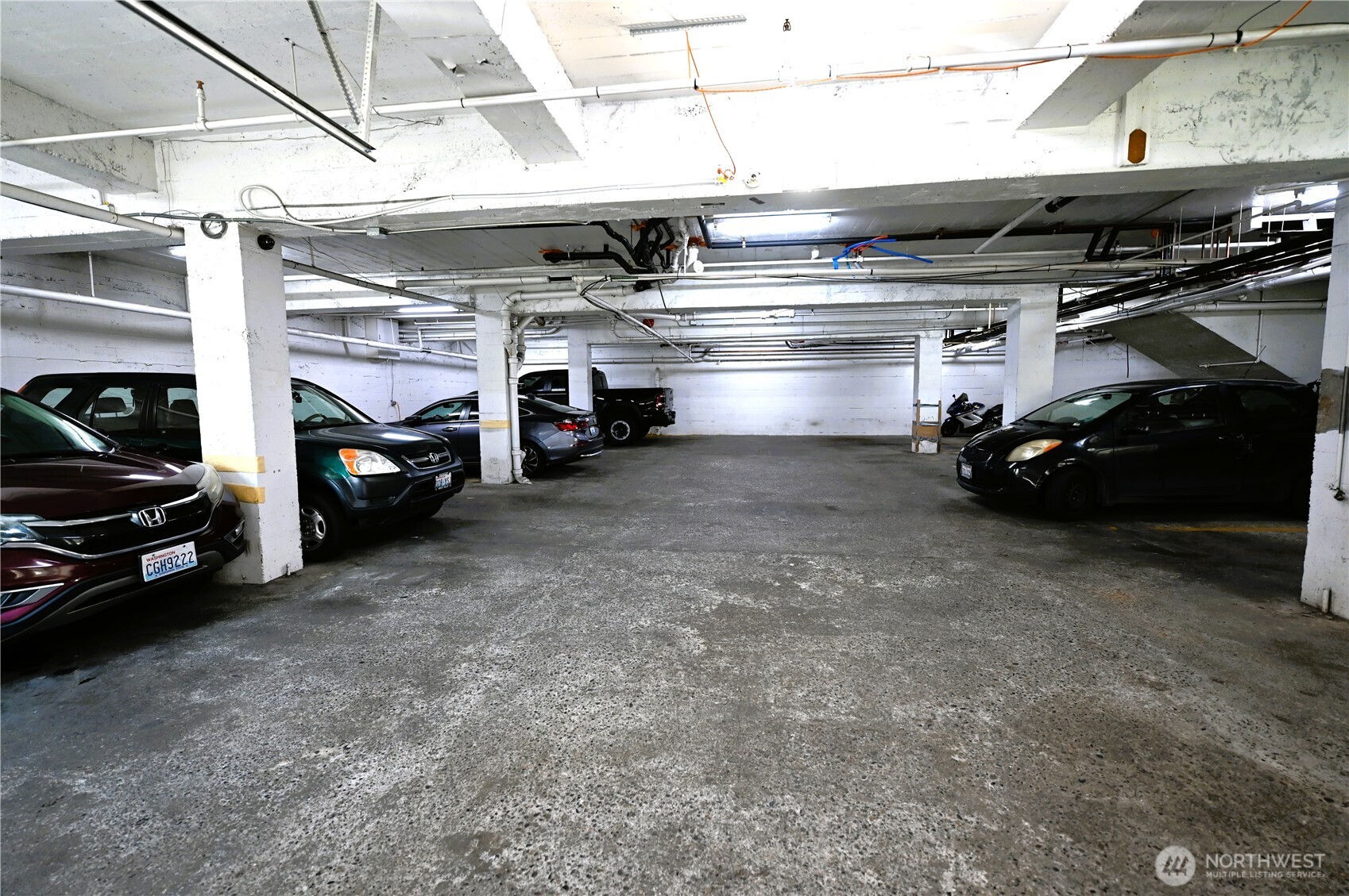 16 Valley Street Seattle, WA 98109 - Photo 11 of 40 a view of parking garage with cars