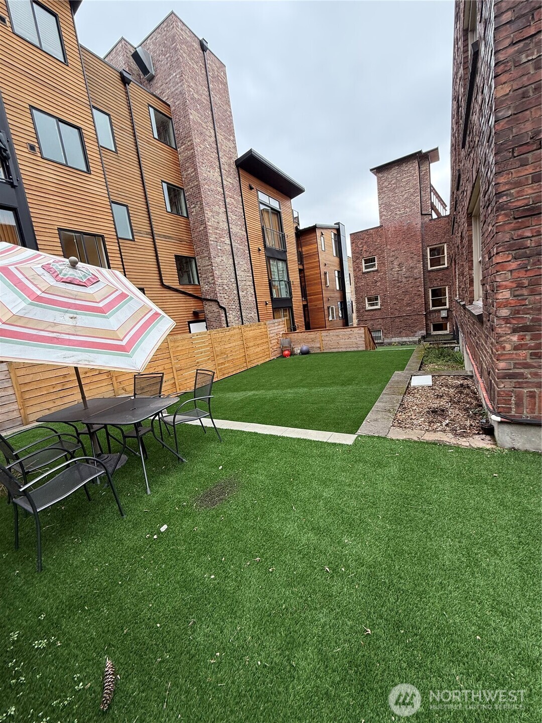 16 Valley Street Seattle, WA 98109 - Photo 16 of 40 a view of a house with a backyard