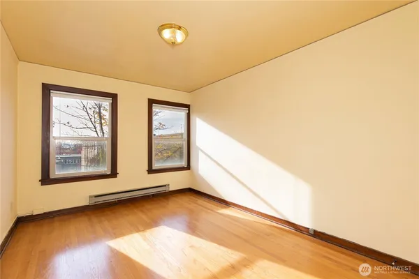 a kitchen with stainless steel appliances a stove sink and cabinets