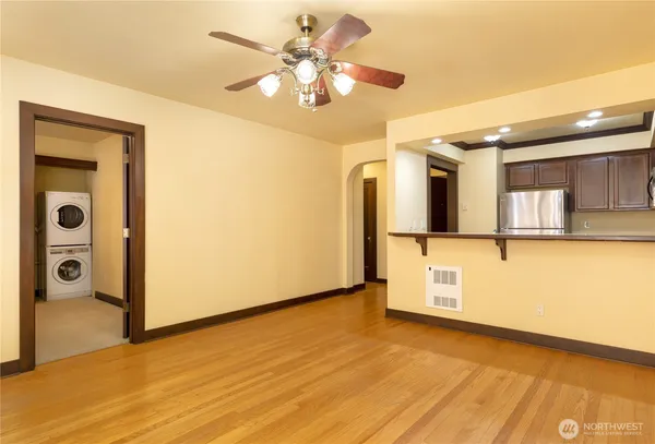 a kitchen with a refrigerator stove and microwave