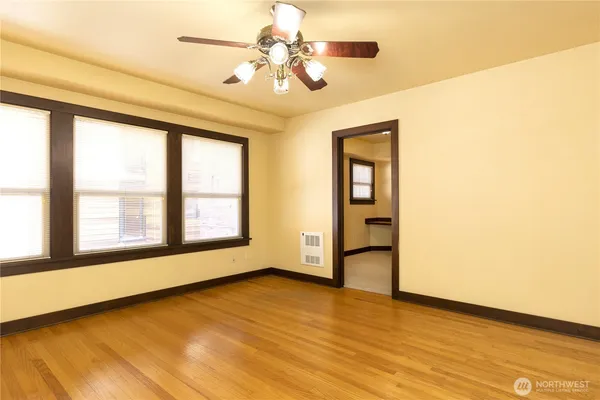 a view of an empty room with a window