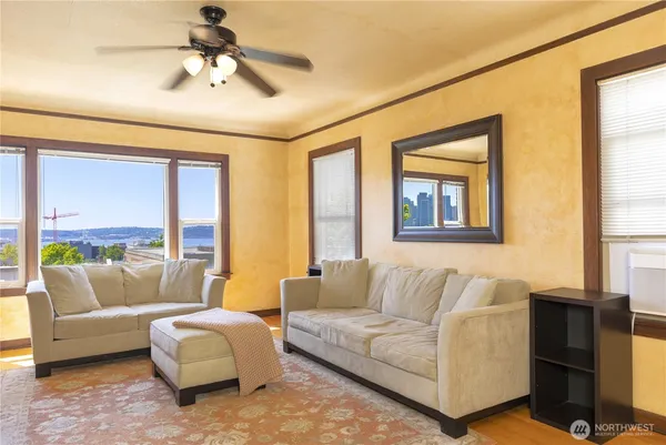 a living room with furniture and a window