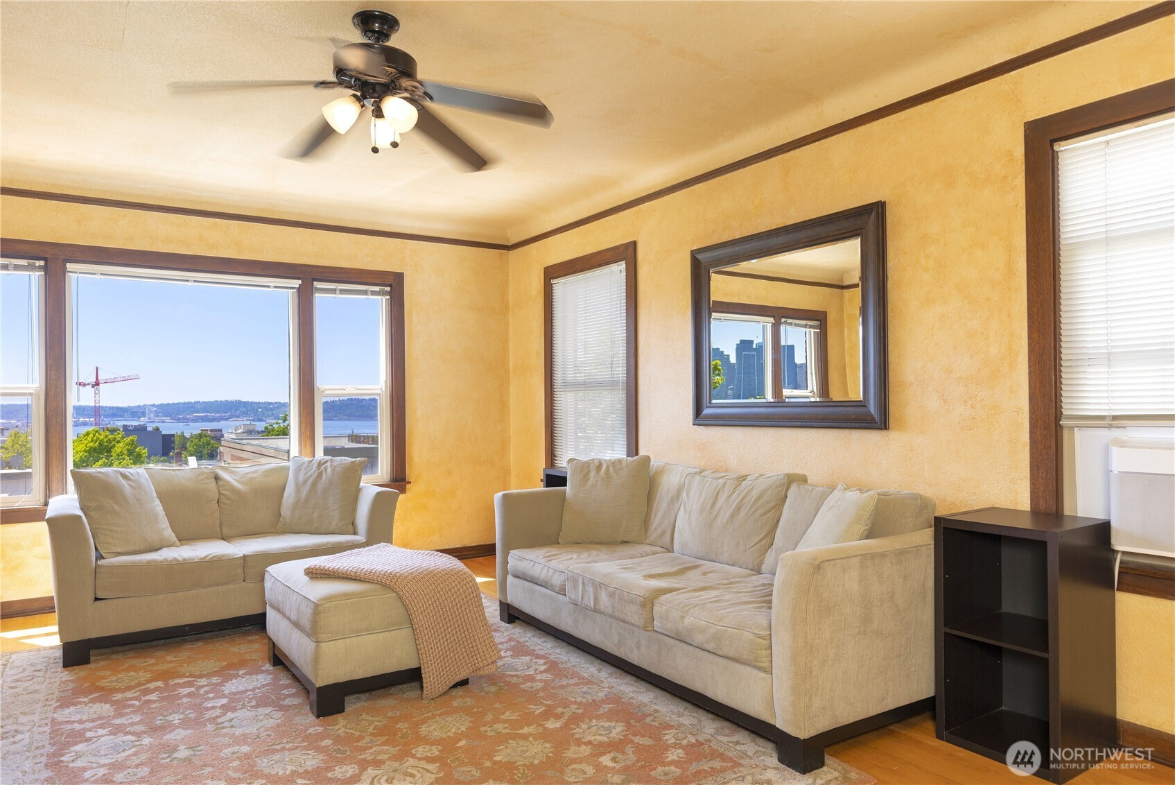 16 Valley Street Seattle, WA 98109 - Photo 29 of 40 a living room with furniture and a flat screen tv