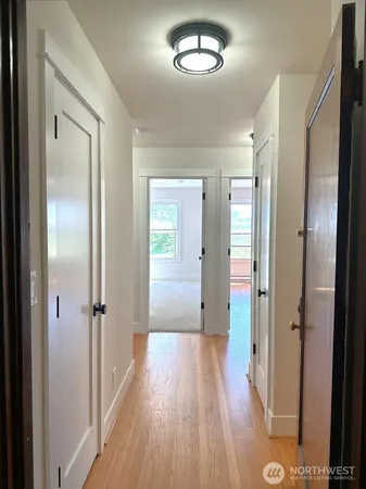a bathroom with a sink toilet and mirror