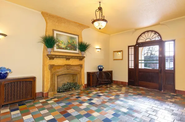 a view of livingroom with furniture window and front door