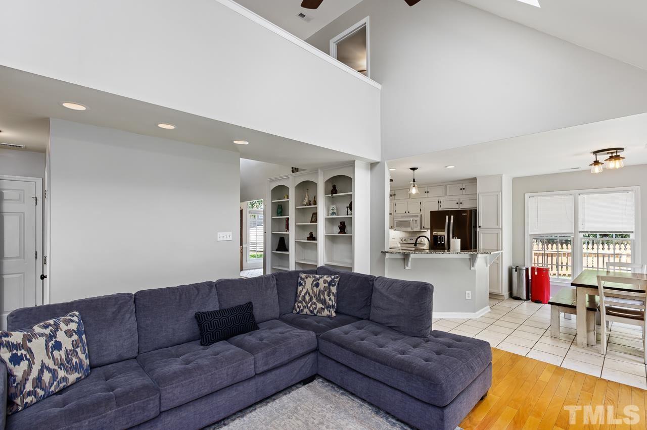 5201 Sutter Way Raleigh, NC 27613 - Photo 5 of 29 Notice the built-in bookshelves and cathedral ceilings.