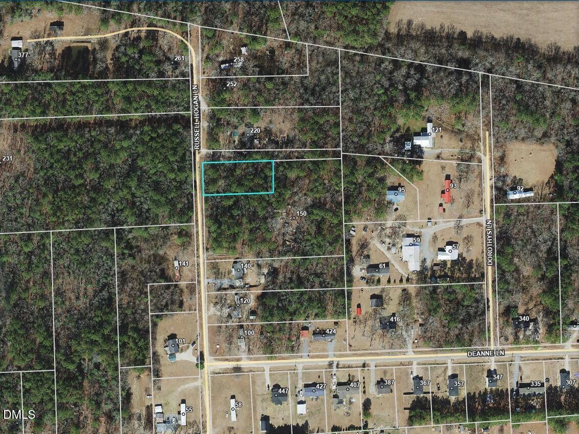 0 Russell Hogan Lane Benson, NC 27504 - Photo 2 of 4 a bathroom with a shower