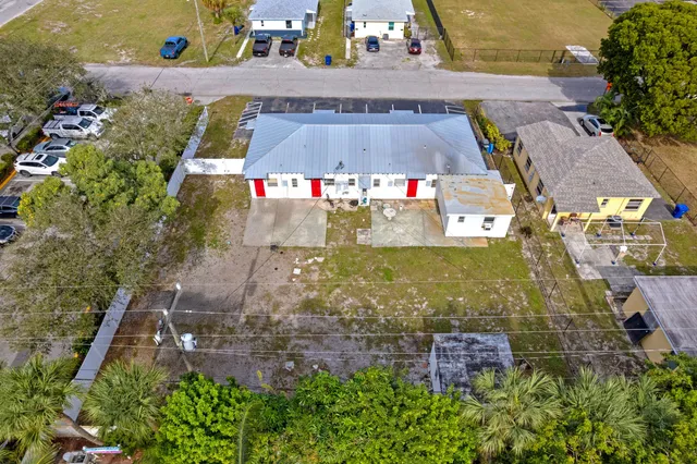 an aerial view of a house with a garden