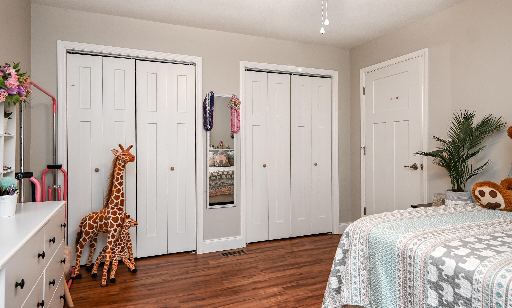 276 Mason Road McDonald, TN 37353 - Photo 39 of 67 a bedroom with a bed and a wooden floor