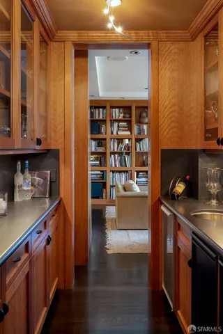 a kitchen with stainless steel appliances granite countertop a stove and a refrigerator