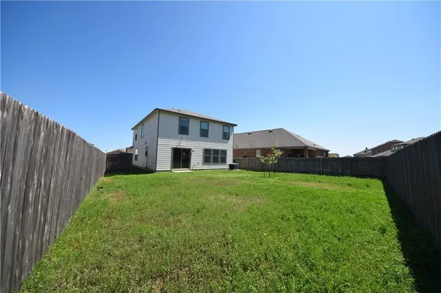 a house view with a garden space