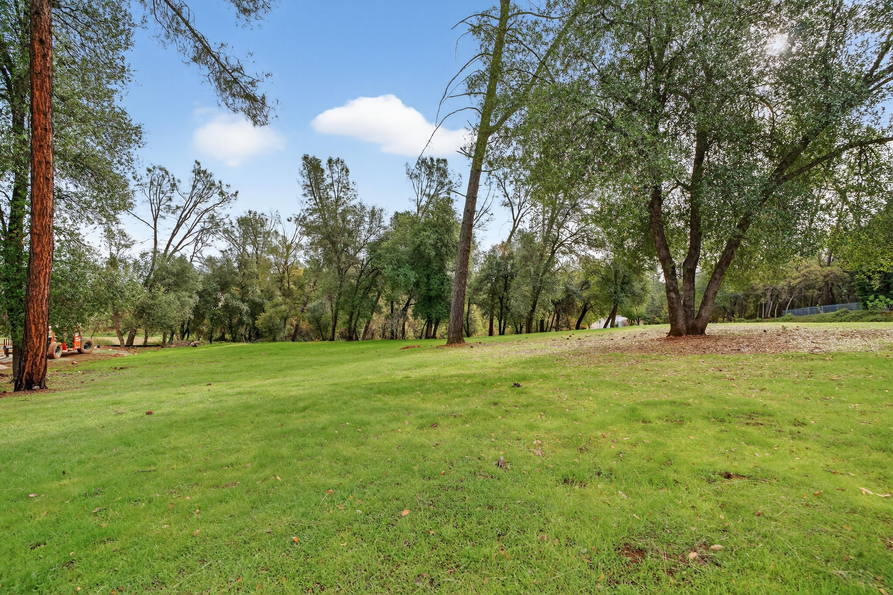 13315 Tierra Heights Road Redding, CA 96003 - Photo 9 of 14 a view of outdoor space with deck and trees