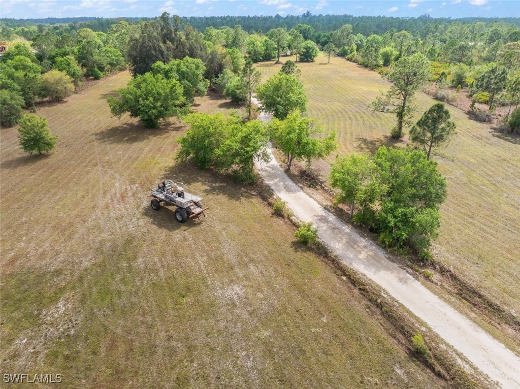 47350 Bermont Road Punta Gorda, FL 33982 - Photo 1 of 41 an aerial view of a house with a yard and lake view
