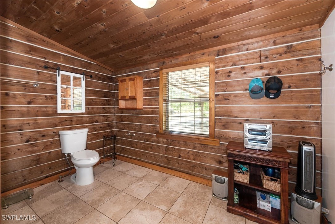 47350 Bermont Road Punta Gorda, FL 33982 - Photo 11 of 41 a bathroom with a toilet and a shower