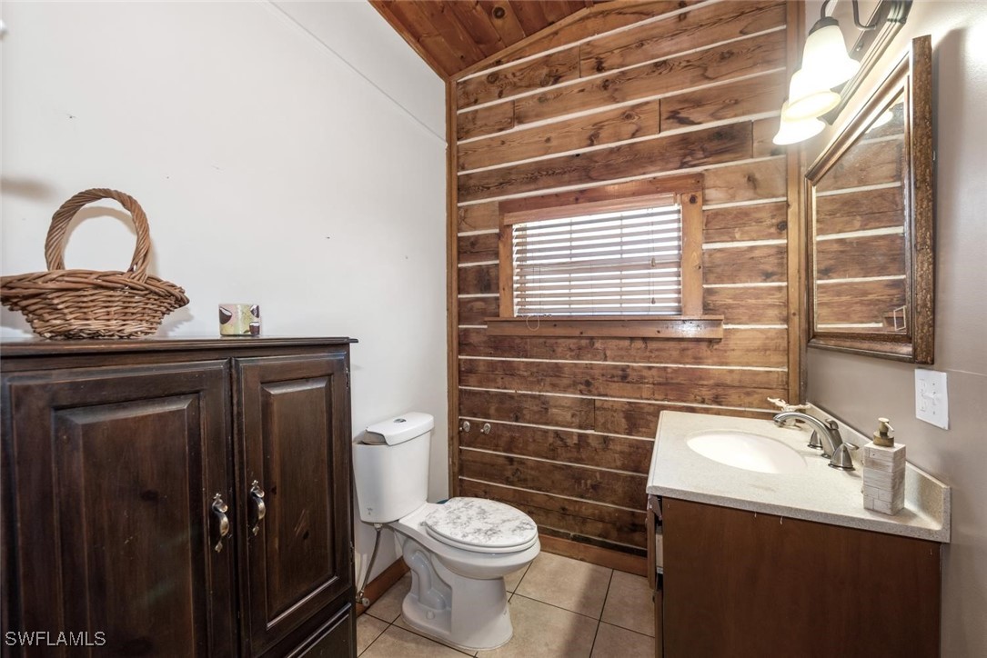 47350 Bermont Road Punta Gorda, FL 33982 - Photo 13 of 41 a bathroom with a sink toilet and shower