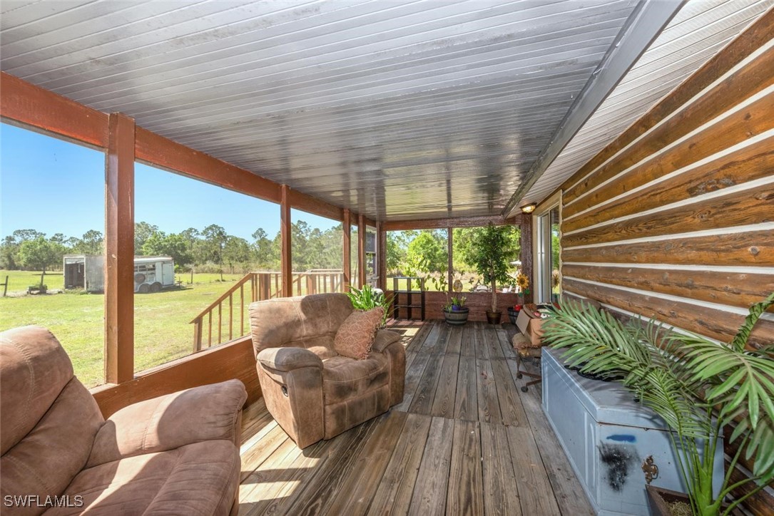 47350 Bermont Road Punta Gorda, FL 33982 - Photo 25 of 41 a living room with furniture and a large window