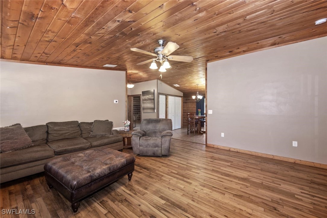 47350 Bermont Road Punta Gorda, FL 33982 - Photo 31 of 41 a living room with furniture and a wooden floor