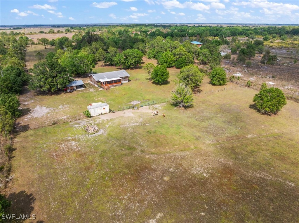 47350 Bermont Road Punta Gorda, FL 33982 - Photo 8 of 41 a view of a lake with a mountain in the back