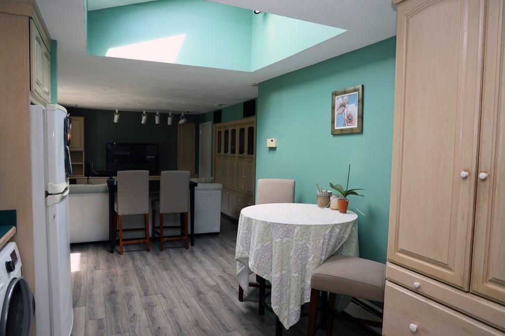 14 Catherine Road Framingham, MA 01701 - Photo 11 of 24 a living room with furniture and a wooden floor