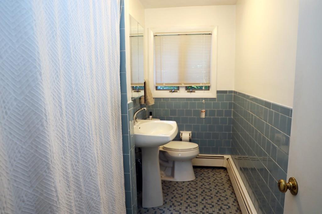 14 Catherine Road Framingham, MA 01701 - Photo 22 of 24 a bathroom with a toilet and a shower