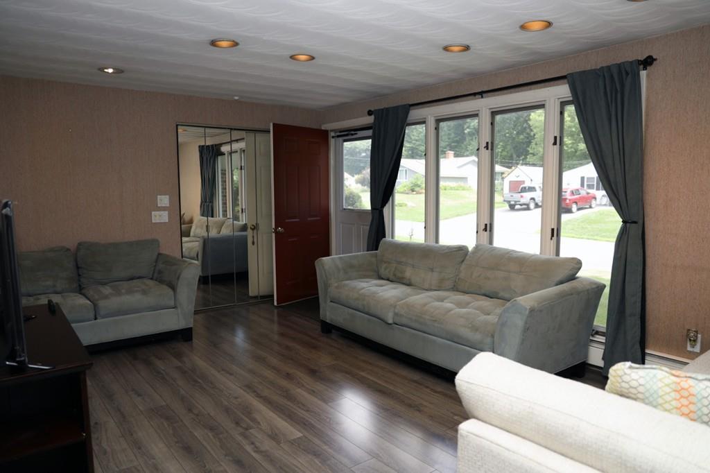 14 Catherine Road Framingham, MA 01701 - Photo 4 of 24 a living room with furniture and a large window