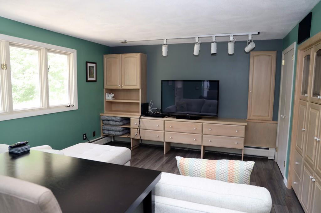 14 Catherine Road Framingham, MA 01701 - Photo 10 of 24 a living room with furniture and a flat screen tv