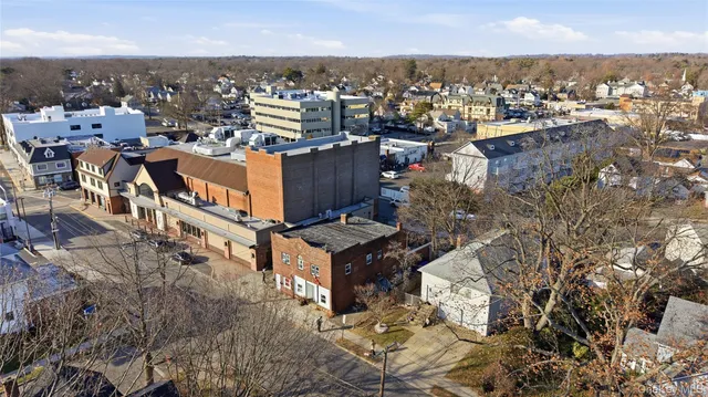 an aerial view of a city with lots of residential buildings
