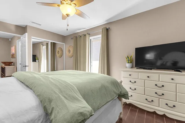 a view of a backyard with swimming pool