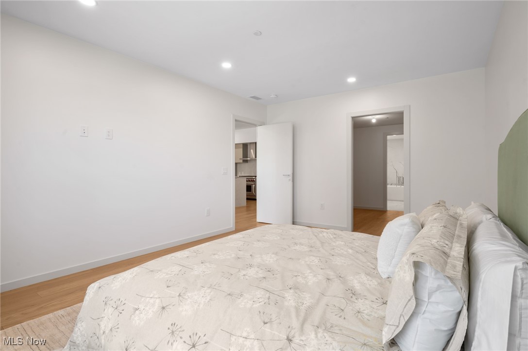 22700 Lake Road, Unit 204 Rocky River, OH 44116 - Photo 13 of 31 Bedroom featuring light wood-type flooring and recessed lighting