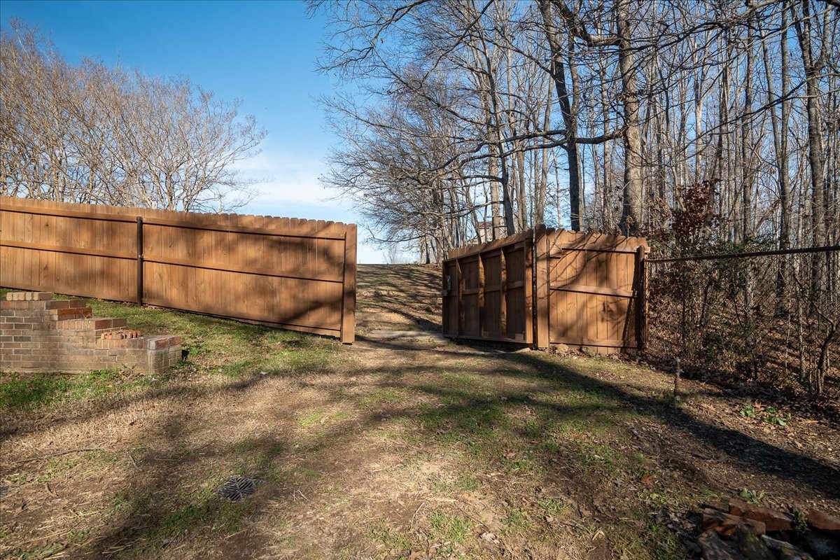 1126 Crowder Road Lawrenceburg, TN 38464 - Photo 11 of 50 a backyard of a house