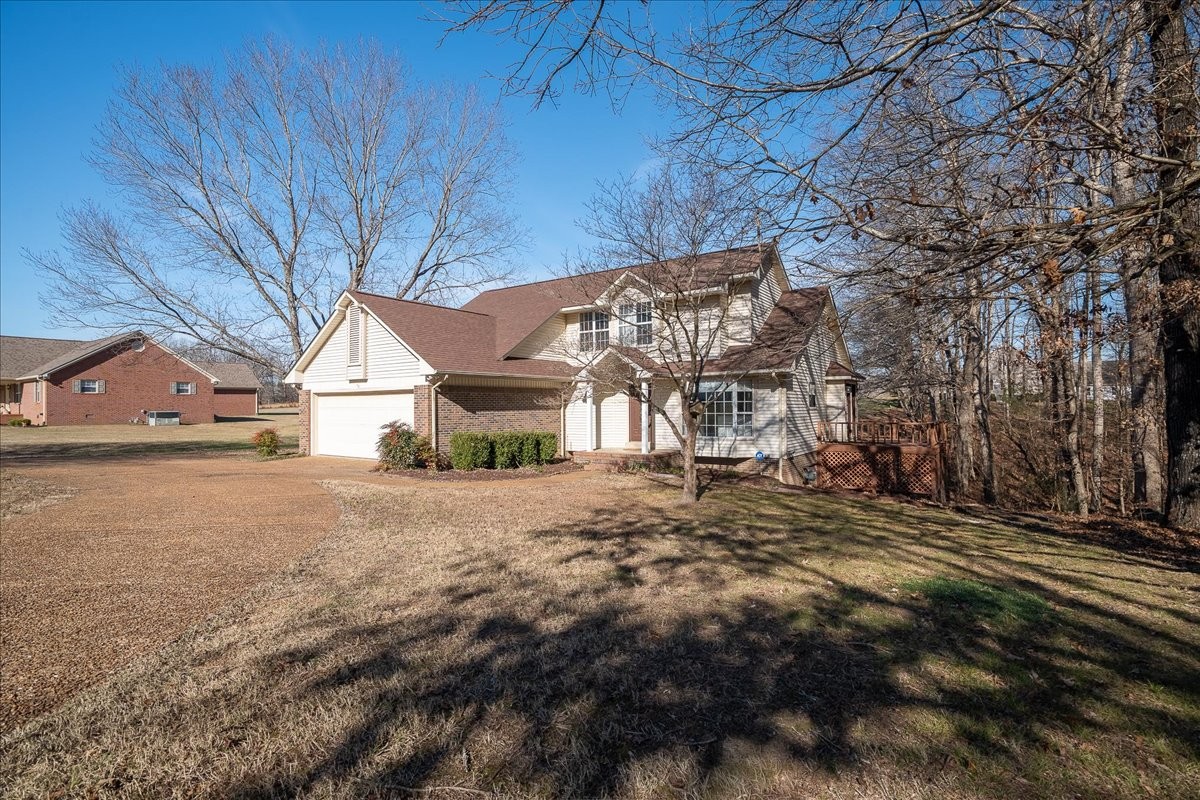 1126 Crowder Road Lawrenceburg, TN 38464 - Photo 3 of 50 a view of a house with a yard