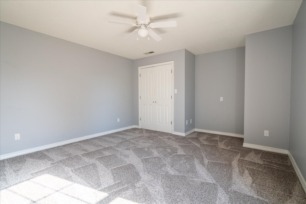 1126 Crowder Road Lawrenceburg, TN 38464 - Photo 36 of 50 a view of an empty room with a ceiling fan