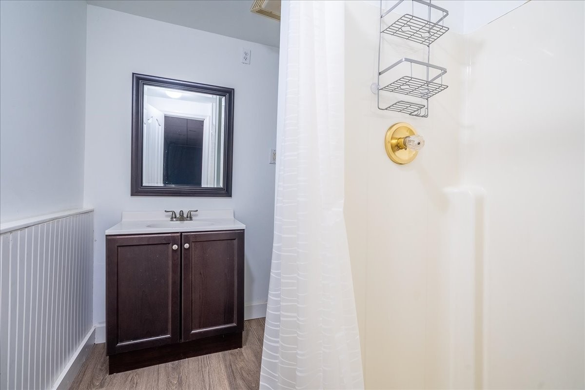 1126 Crowder Road Lawrenceburg, TN 38464 - Photo 39 of 50 a bathroom with a sink and mirror