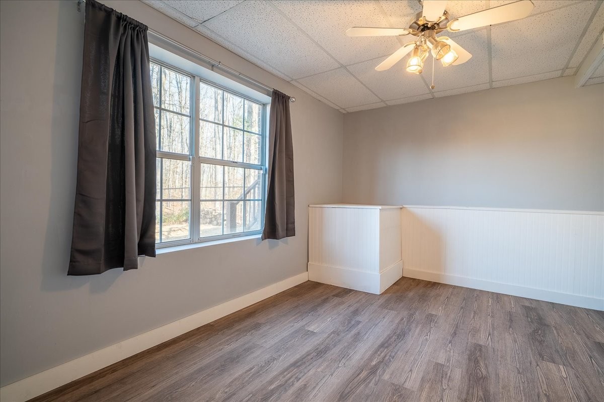 1126 Crowder Road Lawrenceburg, TN 38464 - Photo 47 of 50 wooden floor in an empty room with a window
