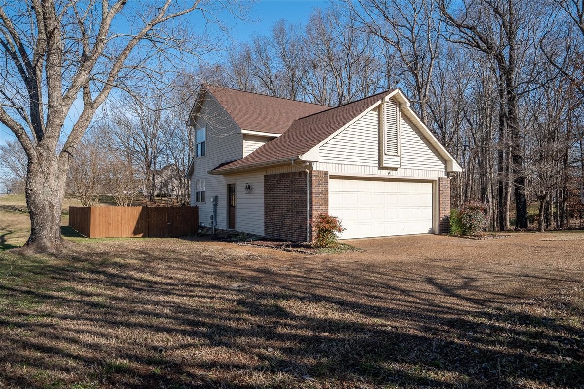 1126 Crowder Road Lawrenceburg, TN 38464 - Photo 6 of 50 a view of a house with a yard
