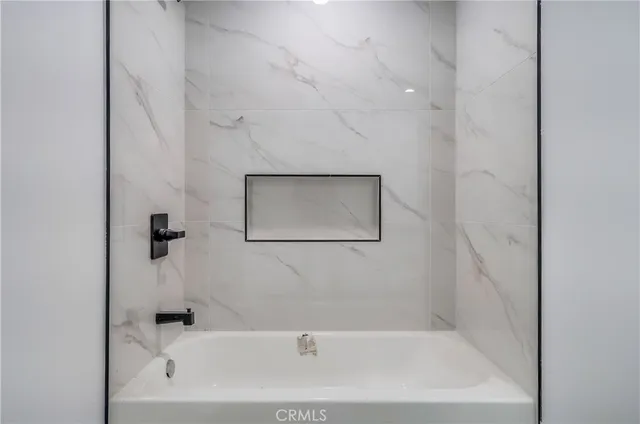 a bathroom with a bathtub