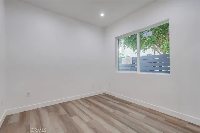 a view of a room that has a window in it