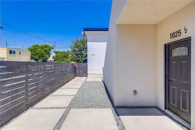 a view of a house with a street